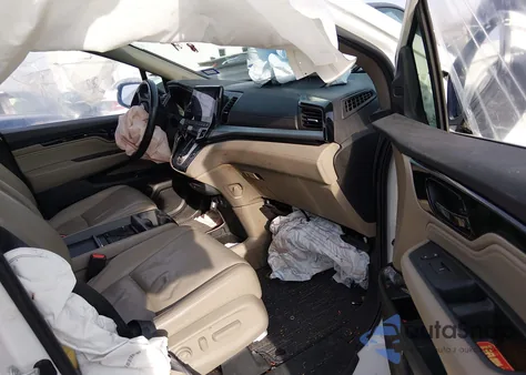 2021 Honda Odyssey Touring z USA, uszkodzony, nr VIN 5FNRL6H87MB034875